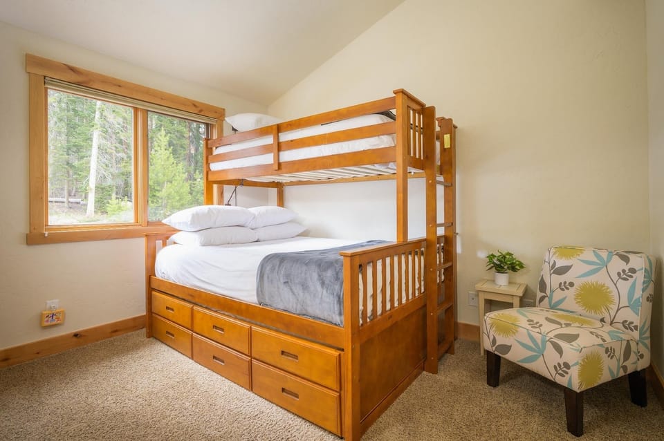 Bunk room with Twin/Queen bunk bed, plus an additional Twin Trundle beneath the lower bunk
