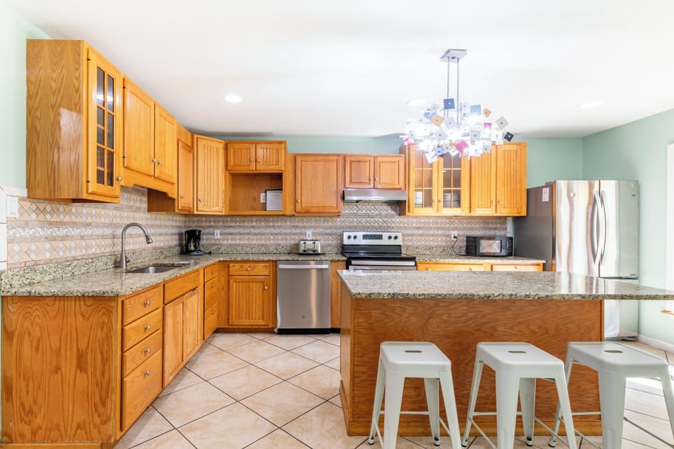 Modern kitchen fully equipped to cook for a large family.