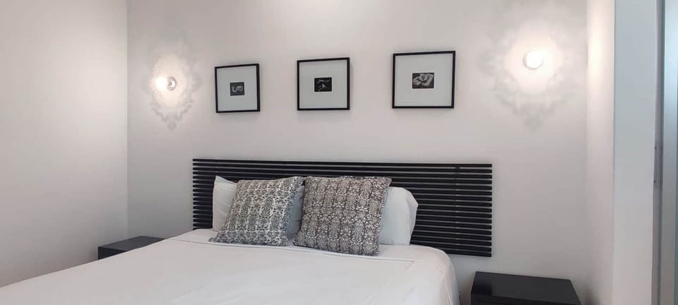 Second bedroom with king bed and full size bathroom