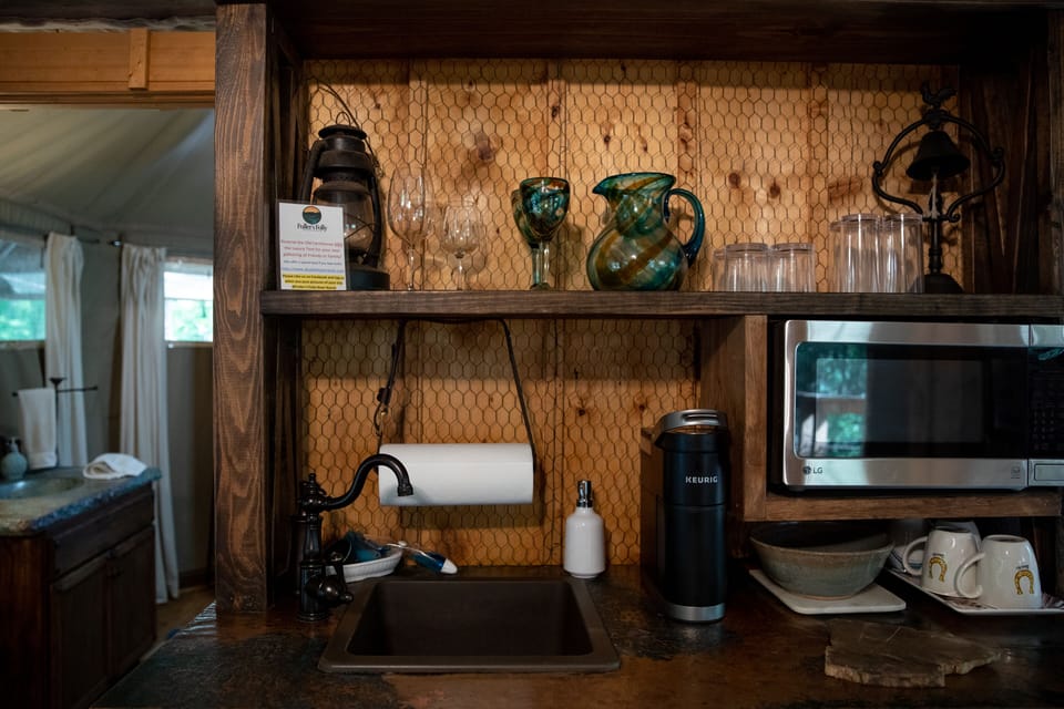 Kitchenette has a sink, microwave, mini fridge, and keurig.  Grill is on the deck.