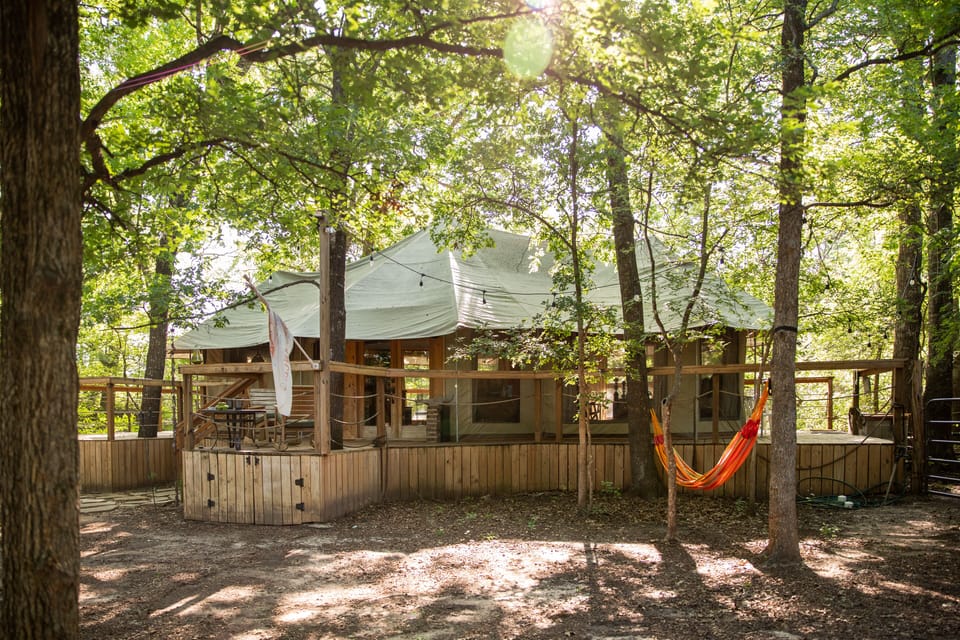 You will awaken to all the colors and sounds of the forest!   Relax in that hammock!