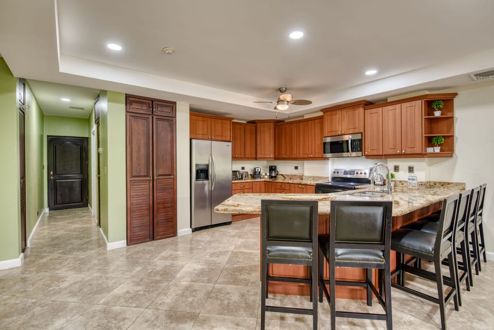View of Kitchen and the 6 bar stools