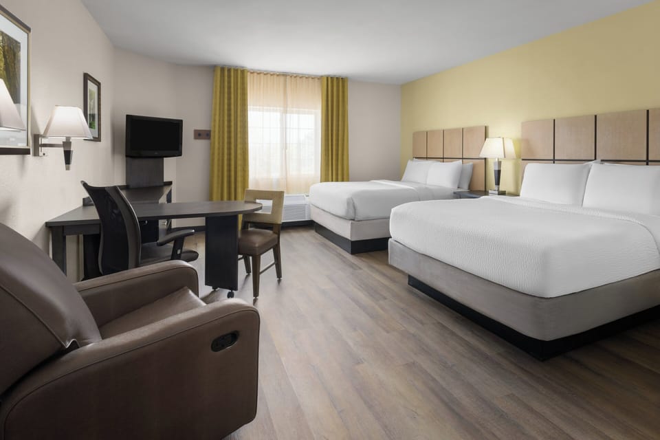 Desk, laptop workspace, blackout drapes, iron/ironing board