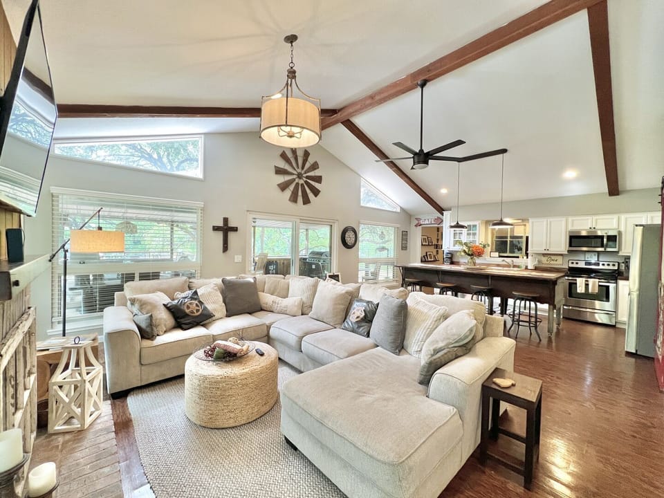 Living + kitchen open to covered patio