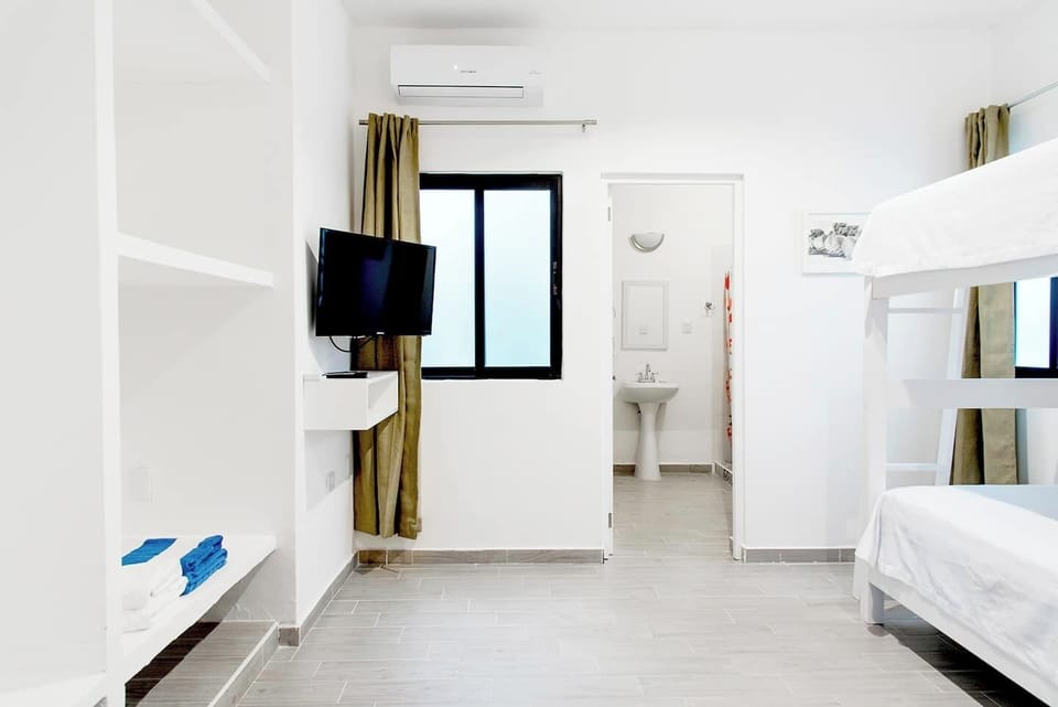 Second bedroom, 2 bunk beds, 4 beds total. Bathroom attached