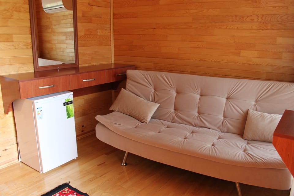 Deluxe Bungalow, 2 Bedrooms | Living area | Flat-screen TV