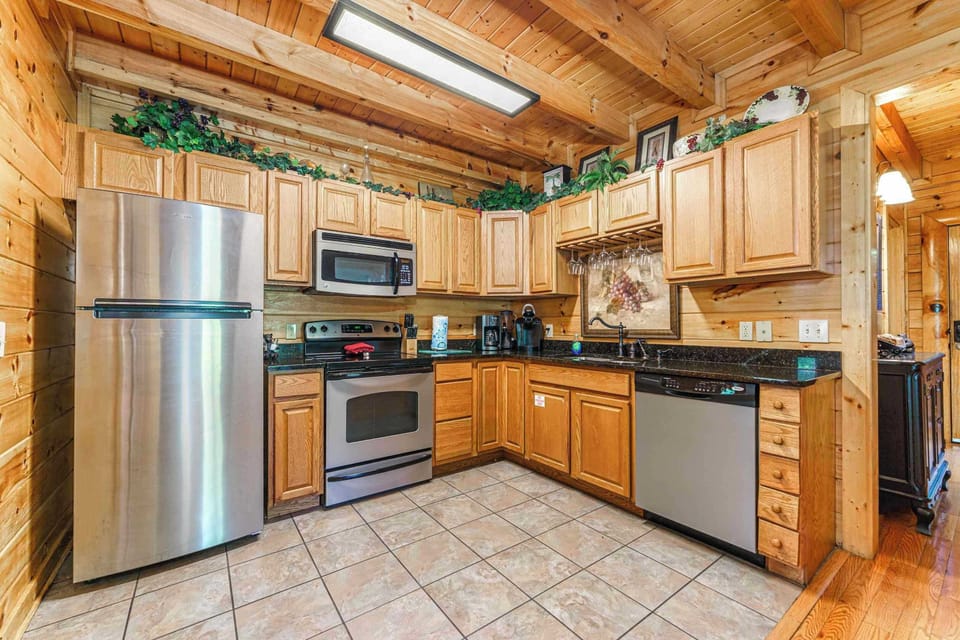 Enjoy a guest‑friendly kitchen stocked with a Keurig, coffee maker, blender, toaster, and crock pot for all your cooking needs