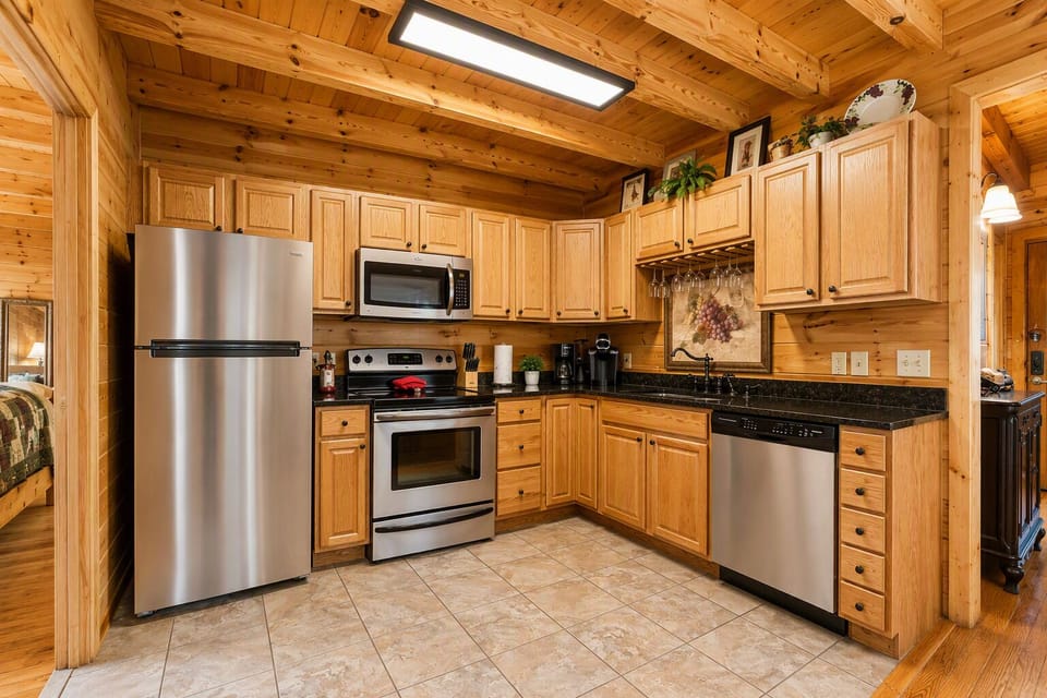 Enjoy a guest‑friendly kitchen stocked with a Keurig, coffee maker, blender, toaster, and crock pot for all your cooking needs