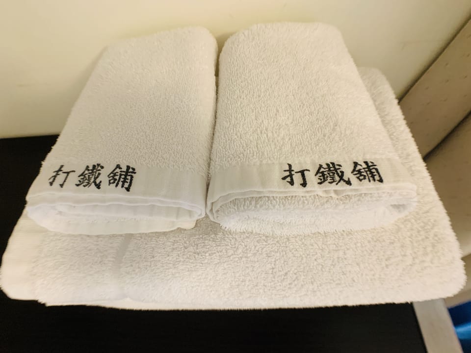 Shower, free toiletries, hair dryer, slippers