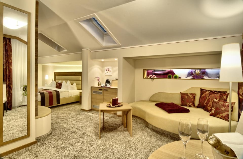 Superior Suite | Living room | Flat-screen TV