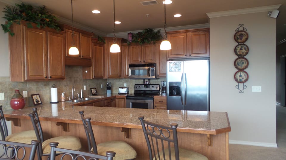 Counter seating for 4 in addition to dining seating for 6.