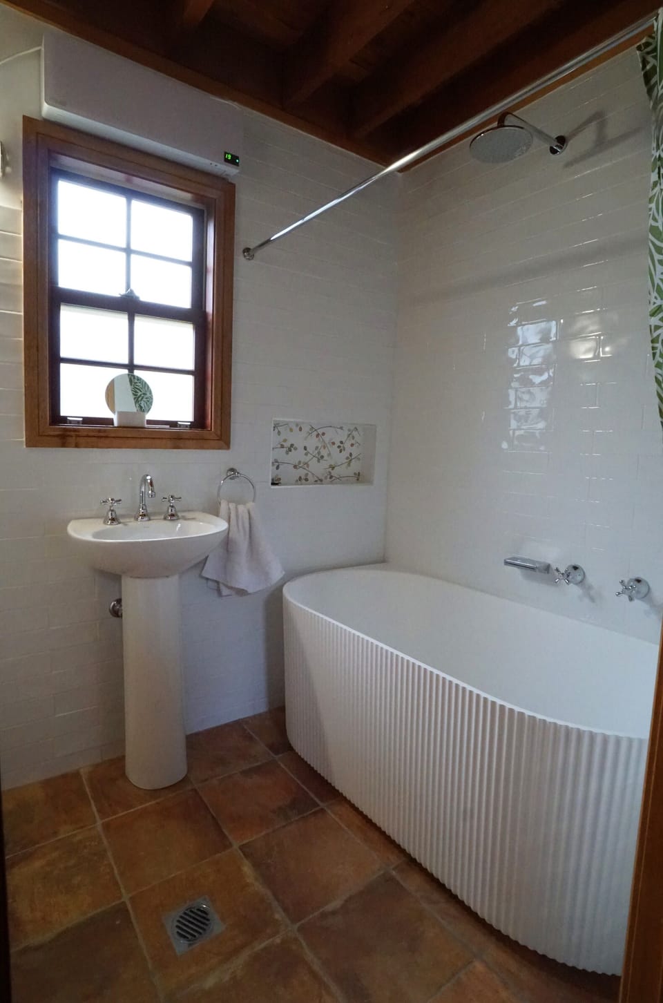 New bathroom with deep fluted bath and shower