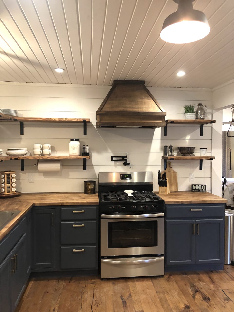 Gas stove for cooking, kitchen well stocked for those who like to cook.