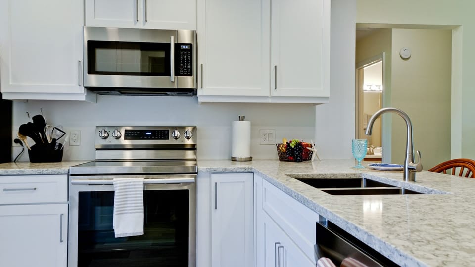 Fully stocked kitchen for cooking at home.