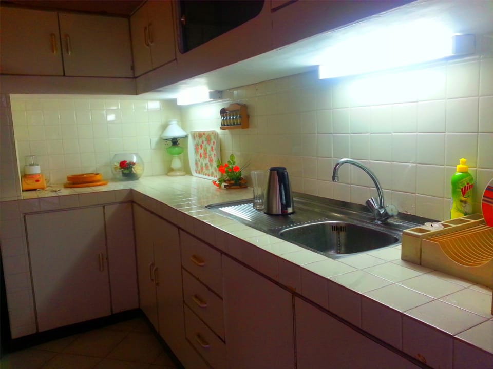 Mini-fridge, oven, cookware/dishes/utensils