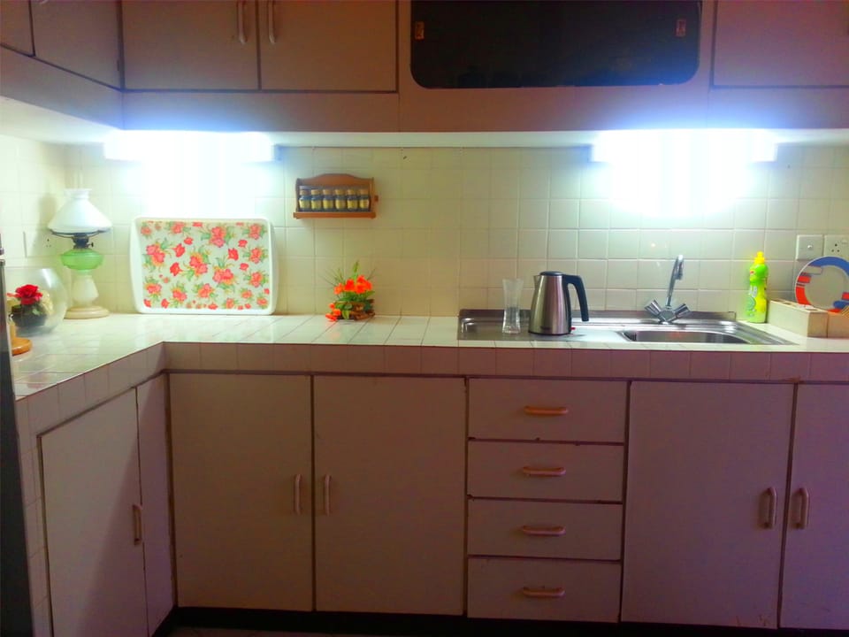 Mini-fridge, oven, cookware/dishes/utensils