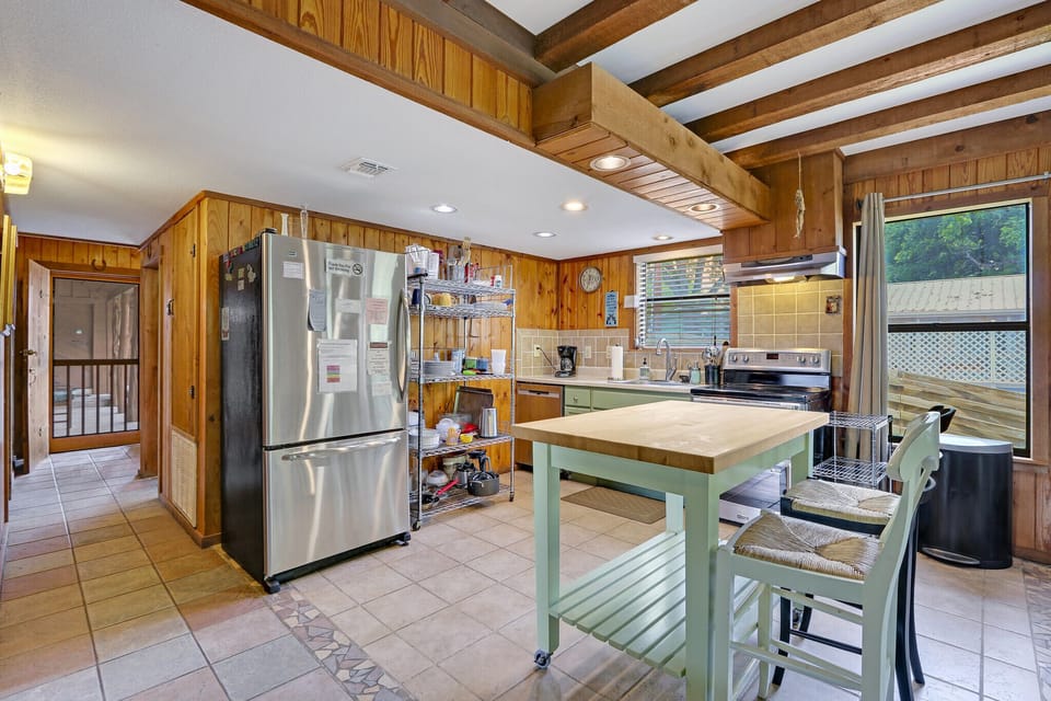 Large kitchen with stainless steel appliances