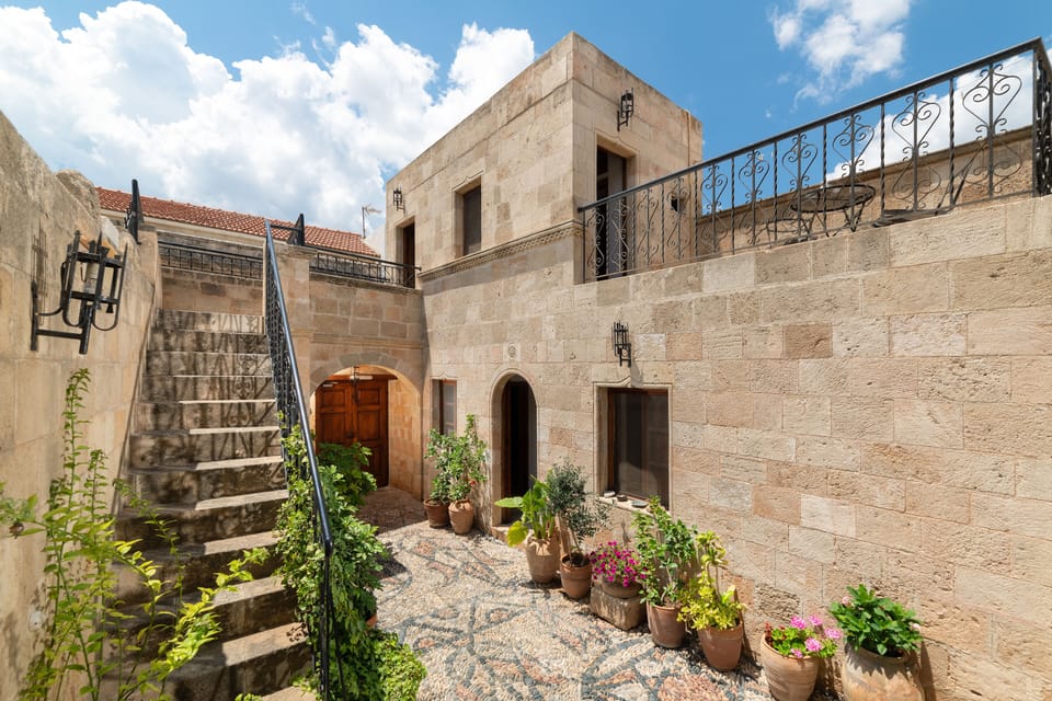 Wonderful spacious courtyard with stairs to Captains Suite and terrace