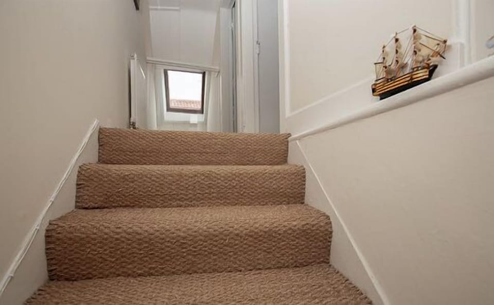 Hall leading to bedrooms 