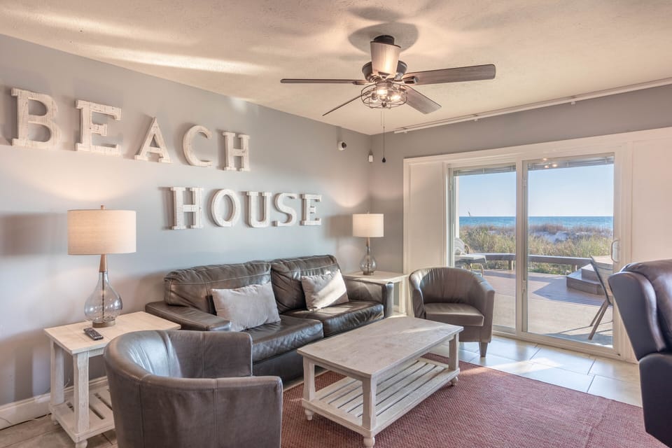 Truly a "Beach House" with a large private beach! New Sliding Glass Door with built in mini blinds for privacy Queen sofa Sleeper 2 Chairs ALL NEW tables and Lamps