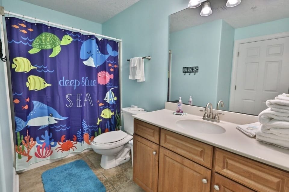 Second bathroom with shower-tub combo