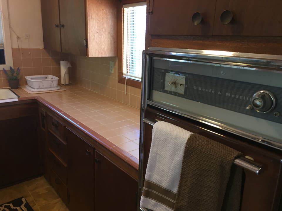 Kitchen has plenty of counter space. 
