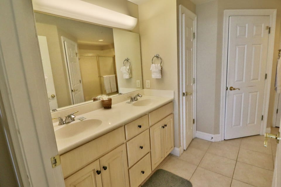 Dual vanities in the master bathroom.