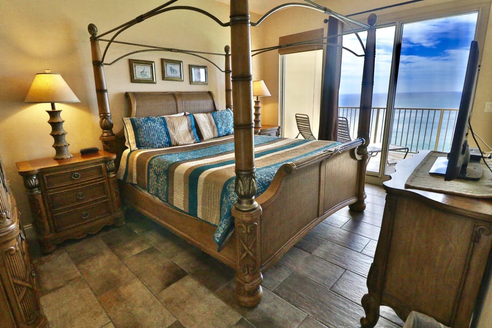 Master bedroom with a king size bed.