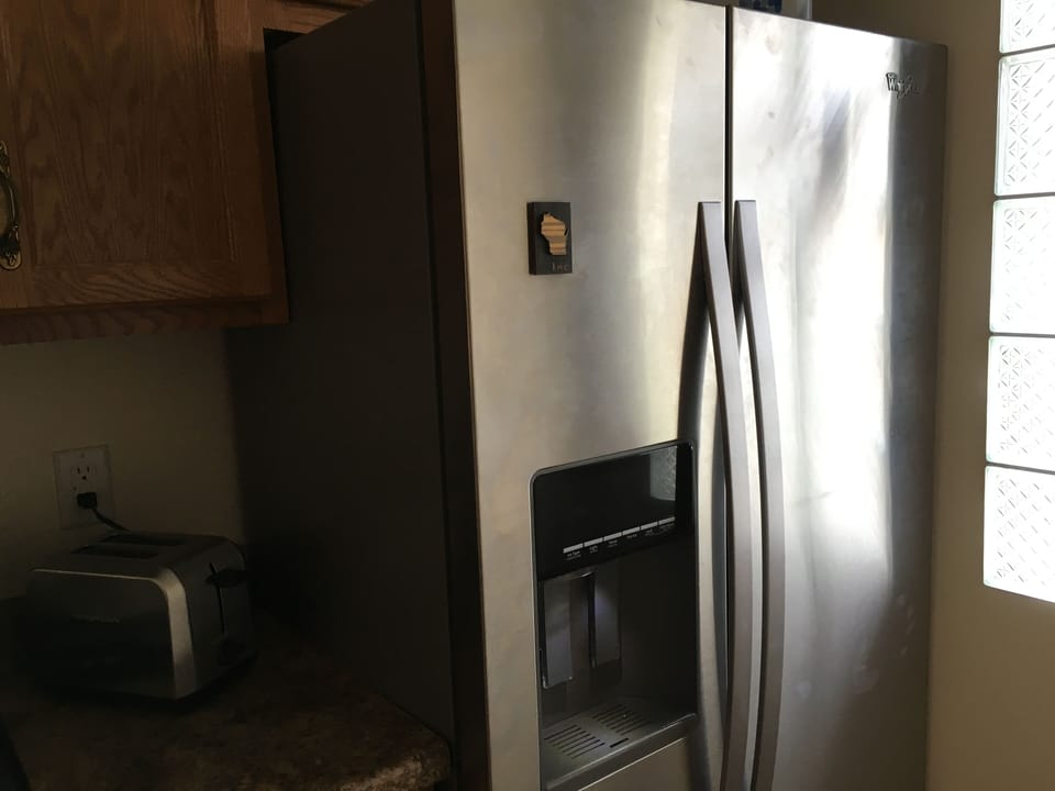 New Stainless Refrigerator with Front Ice and Water. Super cool. 