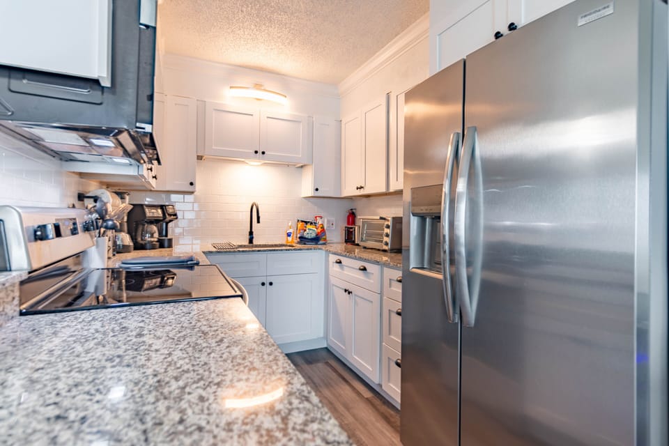 Kitchen - Kitchen Has More Cabinets Than Standard Summit Condo