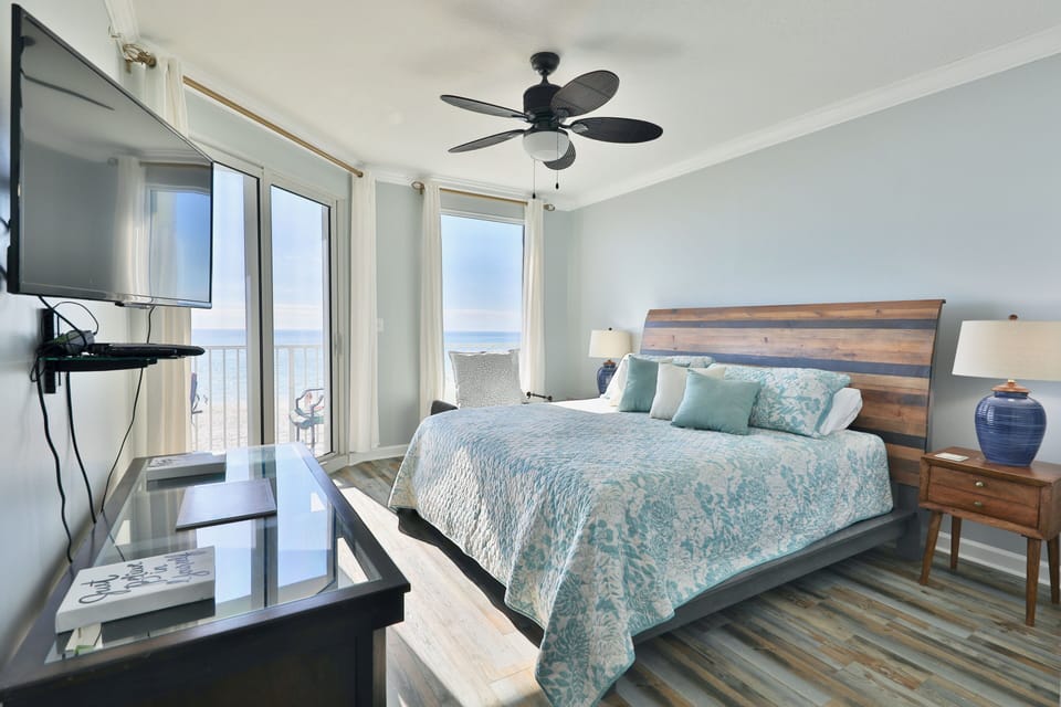 Gulf front master bedroom with a king size bed.