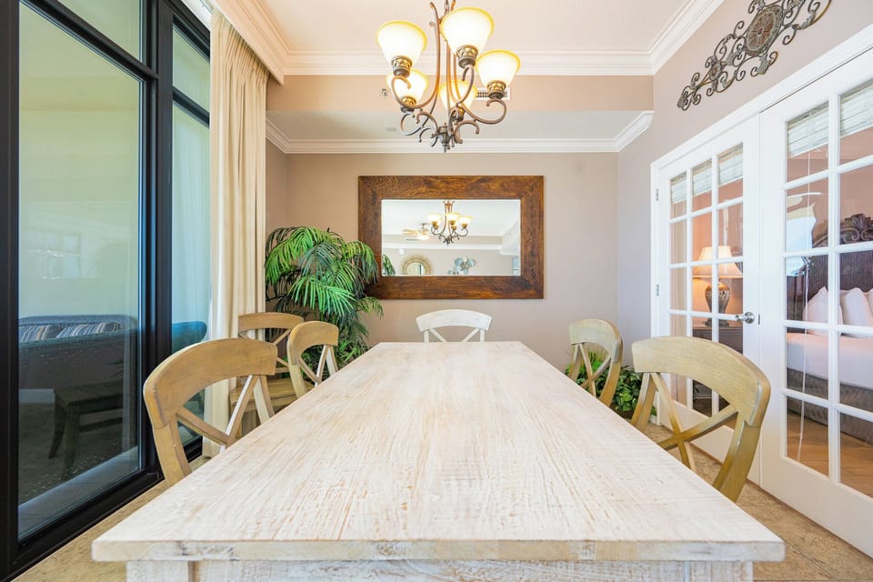 Relax and enjoy laughter with family around the inviting dining table as you take in the coastal views