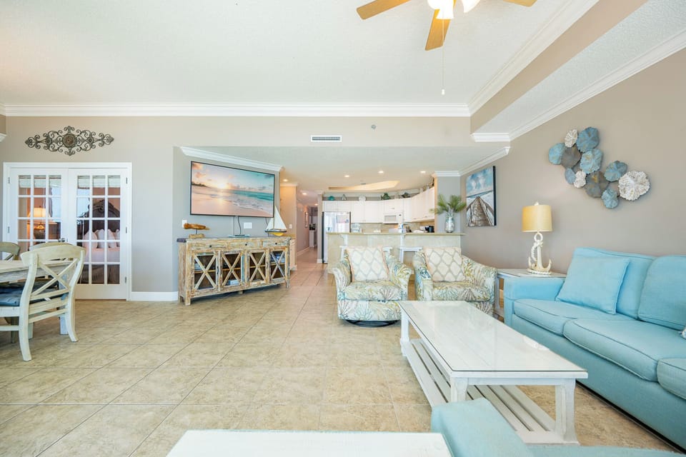 Unwind on the plush sofa with a queen sleeper, streaming your favorite shows while enjoying the coastal vibe
