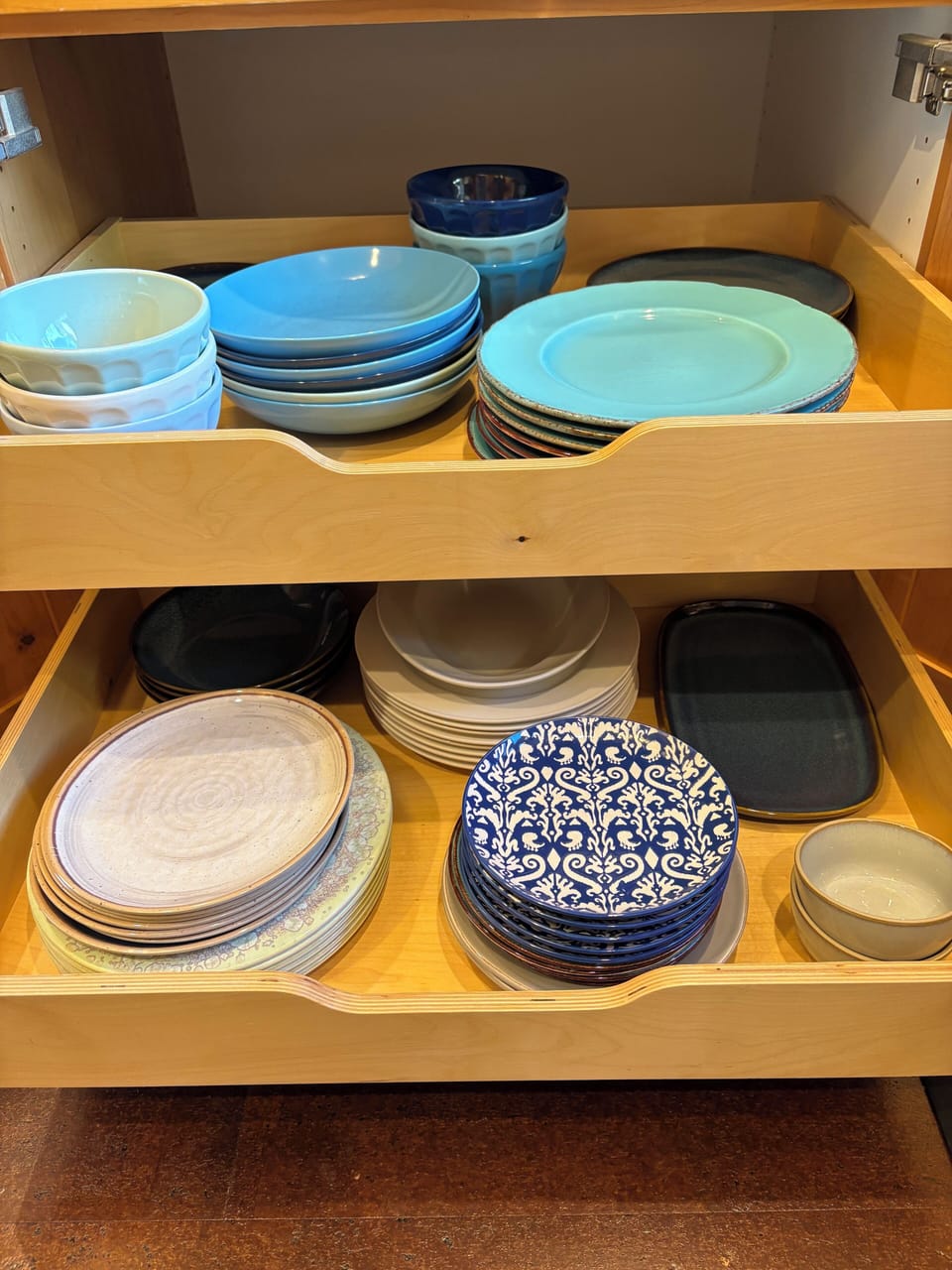 Organized, ergonomic pullout drawers in kitchen.