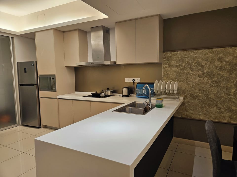 Apartment, 3 Bedrooms | Private kitchen | Full-size fridge, microwave, stovetop, electric kettle