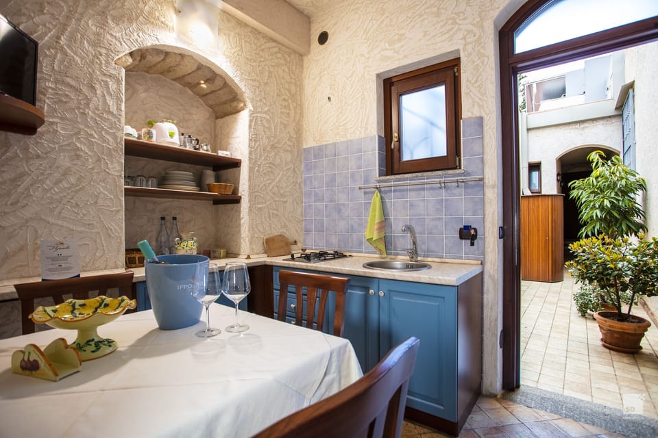 Apartment, Kitchen, Partial Sea View | Private kitchen | Fridge, stovetop, espresso maker, coffee/tea maker