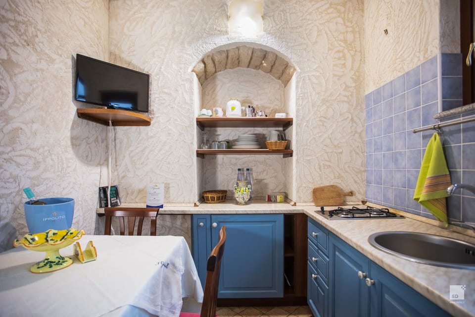 Apartment, Kitchen, Partial Sea View | Private kitchen | Fridge, stovetop, espresso maker, coffee/tea maker