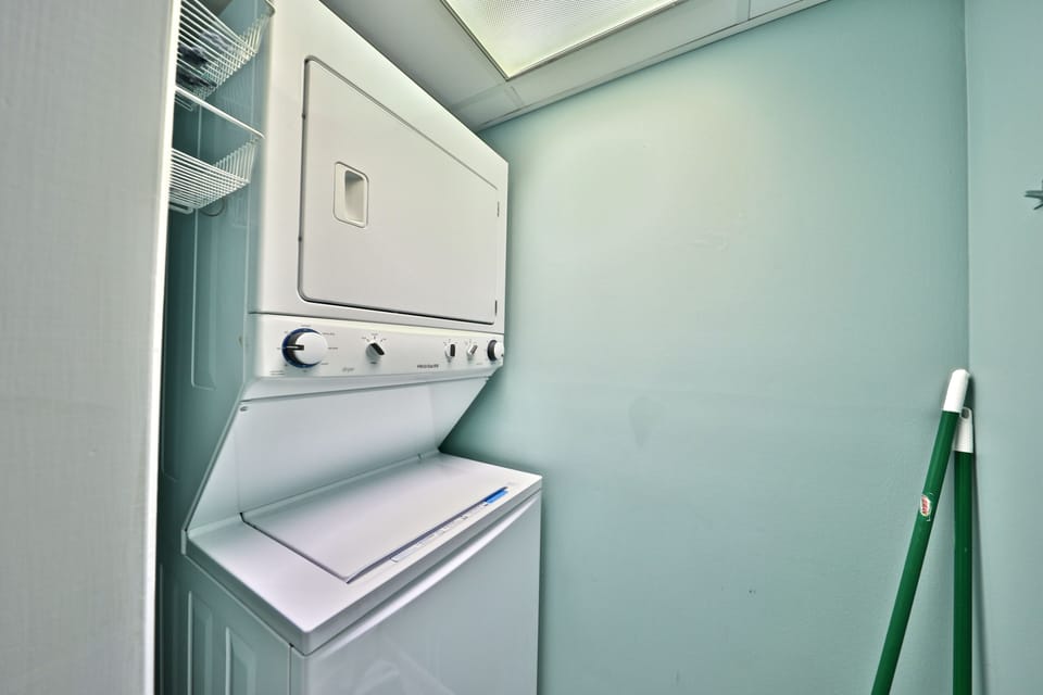 Full size washer and dryer in unit.