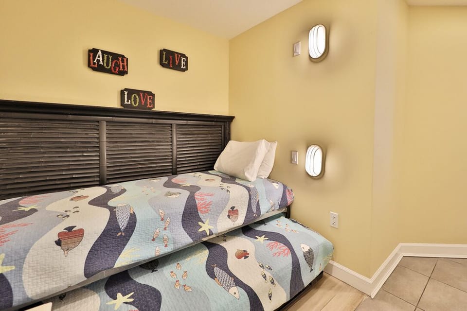 Bonus twin size day bed with trundle bed under.