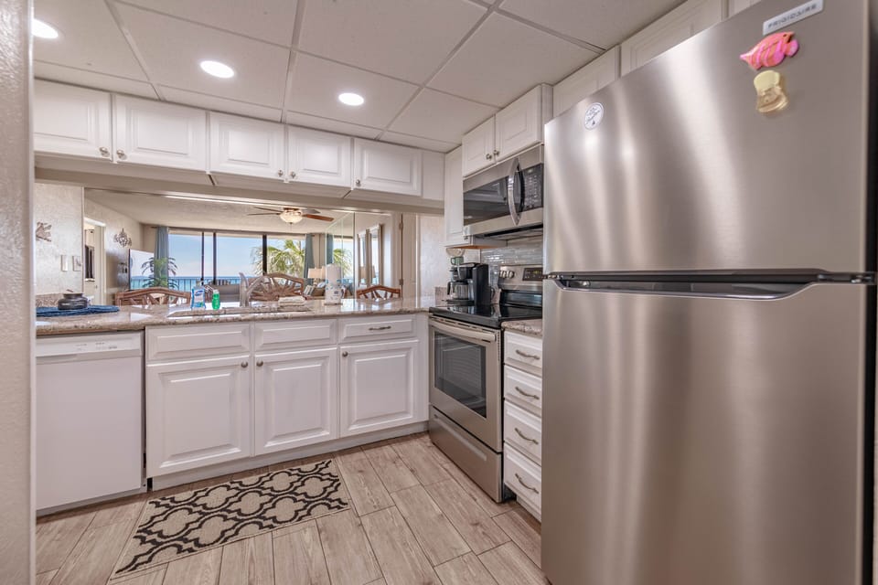 Kitchen with stainless steel appliances and granite countertops