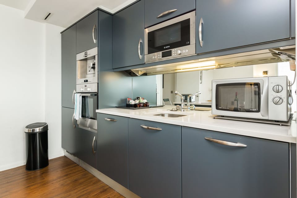 Apartment, 2 Bedrooms | Private kitchen | Full-size fridge, microwave, oven, stovetop