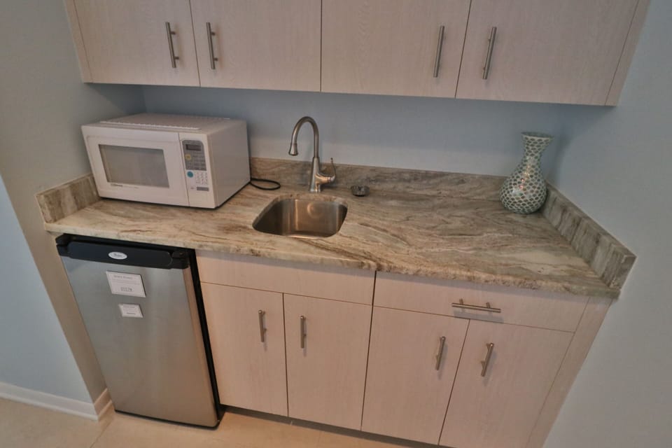 Mini fridge, microwave and sink in the lock out suite.