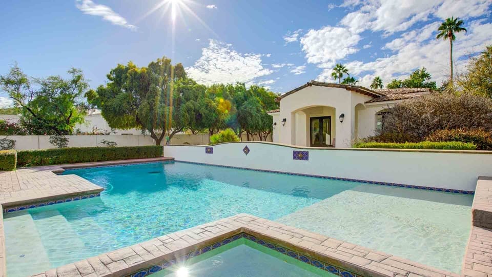 Soak up the sun in the sparkling pool and unwind in the spa