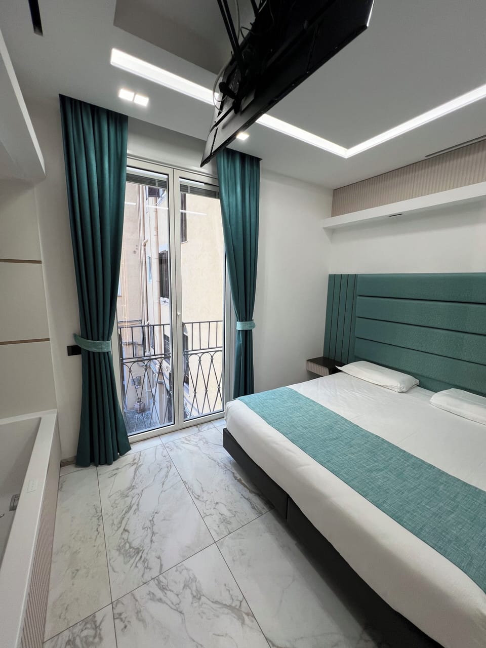 Premium bedding, down comforters, pillowtop beds, in-room safe