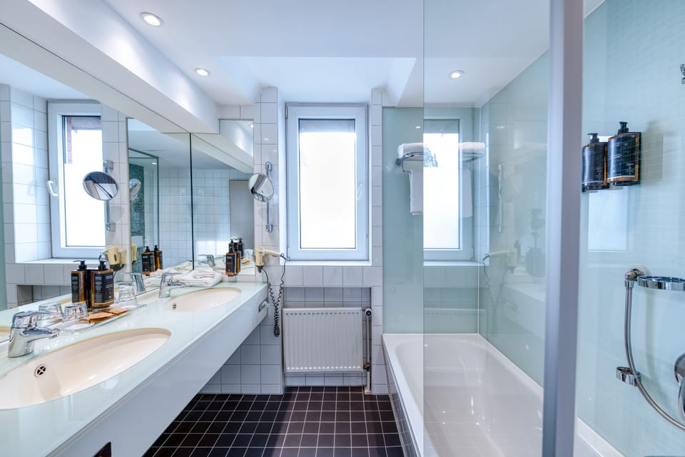 Combined shower/tub, eco-friendly toiletries, hair dryer, towels