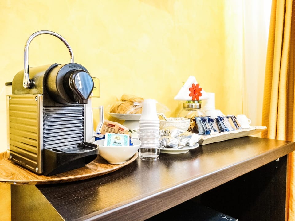 Double or Twin Room | Minibar, in-room safe, desk, iron/ironing board