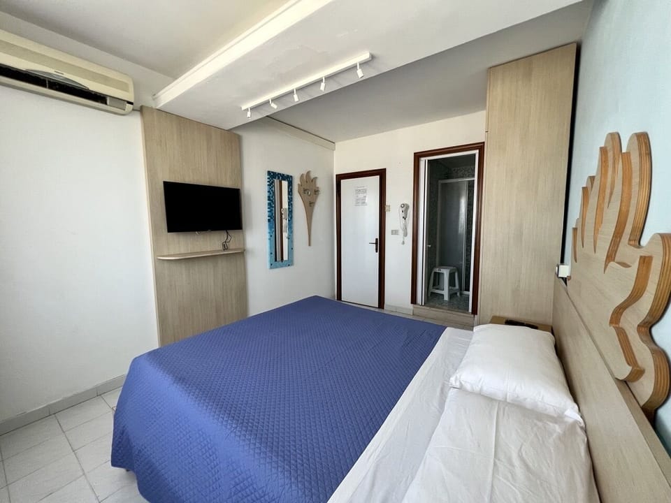 Desk, laptop workspace, free WiFi, bed sheets