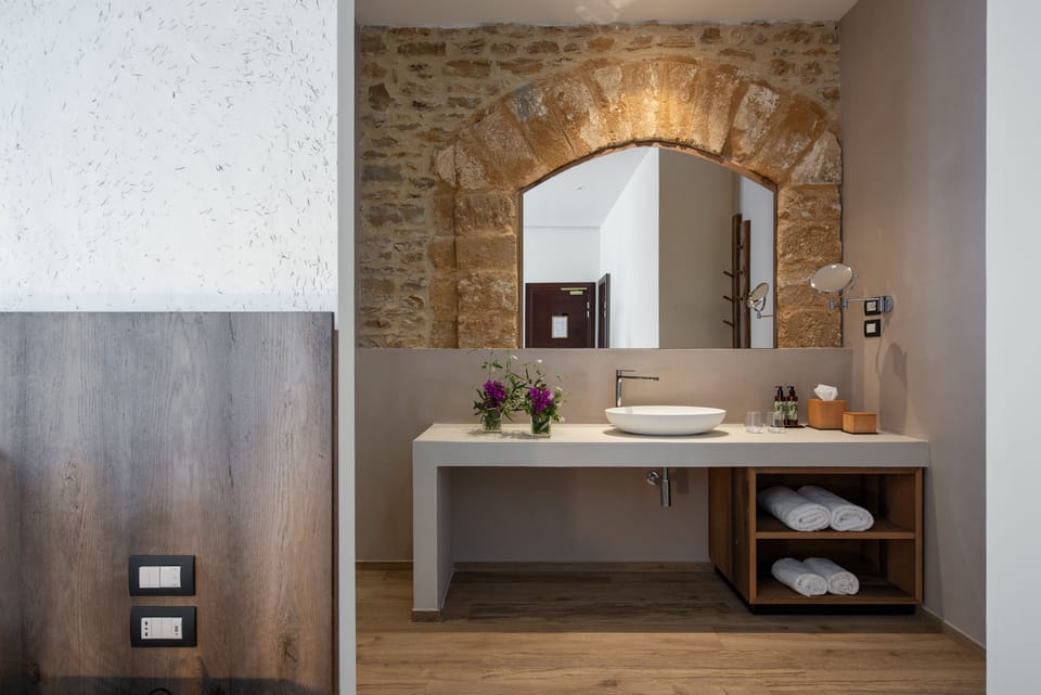 Suite, Garden View | Premium bedding, minibar, in-room safe, desk