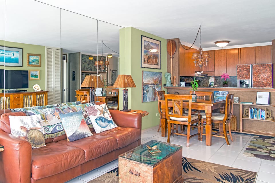 Living room with comfy leather couch-bed 