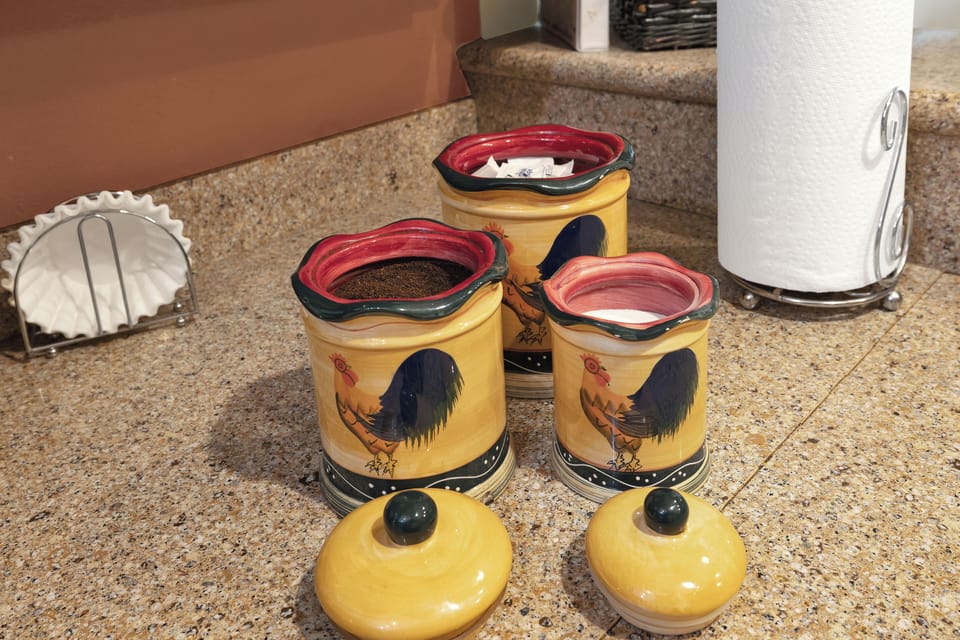 Coffee, creamer, and sugar are provided for the automatic